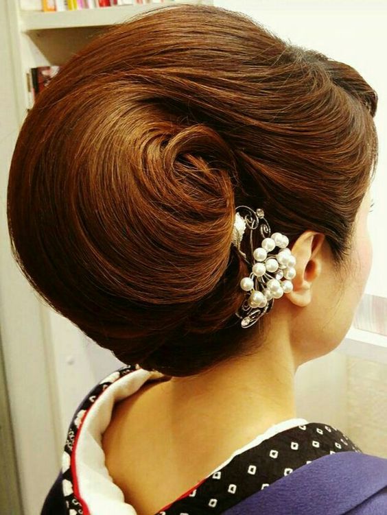 Coiffure coquillage sur cheveux longs