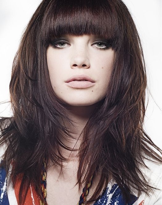 Débuts de la coupe de cheveux des femmes pour le visage rond