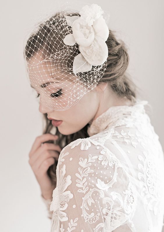 Coiffures de mariage pour cheveux mi-longs avec un voile